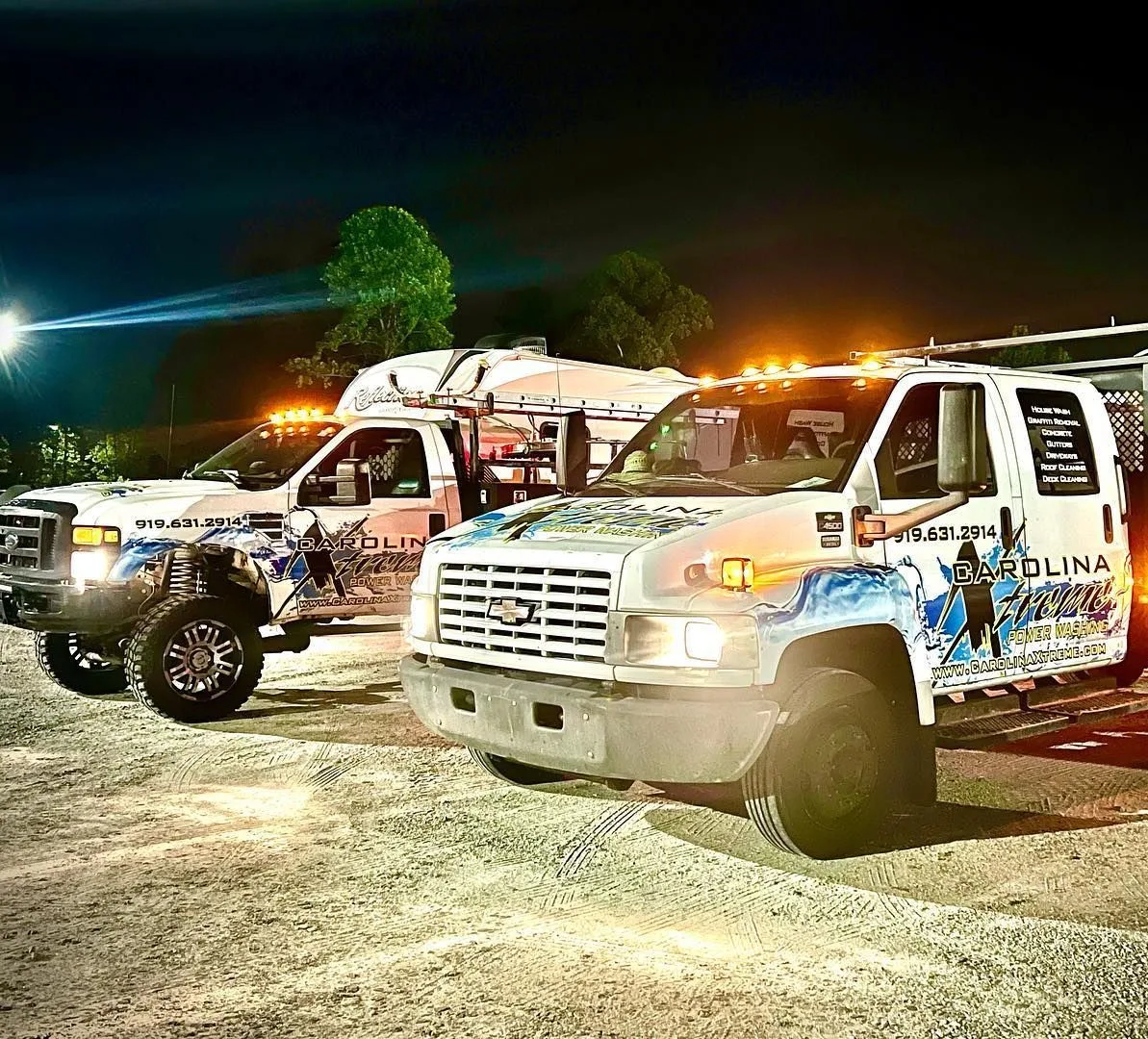 Carolina Xtreme service trucks at a night commercial project